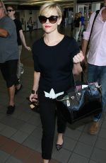 REESE WITHERSPOON Arrives at Los Angeles International Airport 0909
