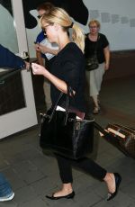 REESE WITHERSPOON Arrives at Los Angeles International Airport 0909