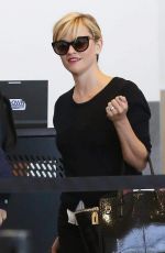 REESE WITHERSPOON Arrives at Los Angeles International Airport 0909