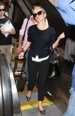 REESE WITHERSPOON Arrives at Los Angeles International Airport 0909