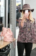 REESE WITHERSPOON Arrives at Rossano Ferretti Hairspa in Beverly Hills