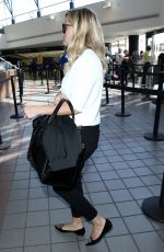REESE WITHERSPOON at Los Angeles International Airport 0609