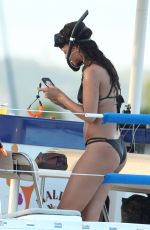 RIHANNA in Bikini at a Boat in Barbados