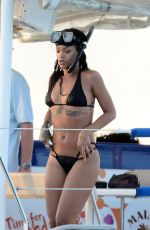 RIHANNA in Bikini at a Boat in Barbados