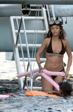 RIHANNA in Bikini at a Boat in Barbados