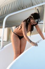 RIHANNA in Bikini at a Boat in Barbados