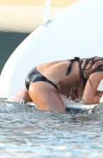 RIHANNA in Bikini at a Boat in Barbados