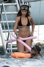 RIHANNA in Bikini at a Boat in Barbados