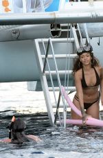 RIHANNA in Bikini at a Boat in Barbados