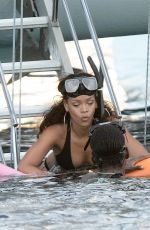 RIHANNA in Bikini at a Boat in Barbados