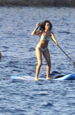 RIHANNA in Bikini Paddleboarding in Italy