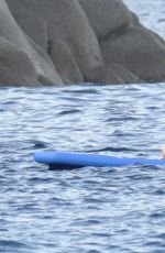 RIHANNA in Bikini Paddleboarding in Italy