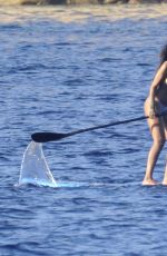 RIHANNA in Bikini Paddleboarding in Italy