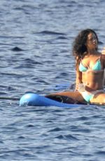 RIHANNA in Bikini Paddleboarding in Italy