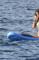 RIHANNA in Bikini Paddleboarding in Italy