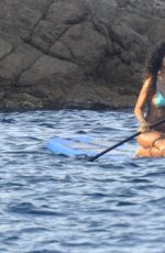 RIHANNA in Bikini Paddleboarding in Italy
