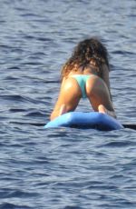 RIHANNA in Bikini Paddleboarding in Italy