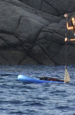 RIHANNA in Bikini Paddleboarding in Italy