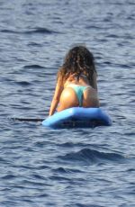 RIHANNA in Bikini Paddleboarding in Italy
