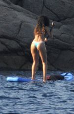RIHANNA in Bikini Paddleboarding in Italy