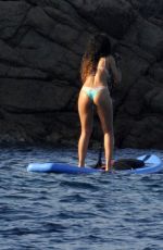 RIHANNA in Bikini Paddleboarding in Italy