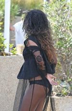 RIHANNA in Racy Sheer Skirt at a Airport in France