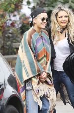 RITA ORA Wearing a Poncho Out in London