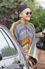 RITA ORA Wearing a Poncho Out in London