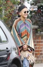 RITA ORA Wearing a Poncho Out in London