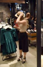 SAMMI HANRATTY Shopping at Aritzia Fifth Avenue in New York