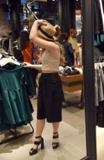 SAMMI HANRATTY Shopping at Aritzia Fifth Avenue in New York