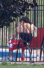 SELENA GOMEZ and Justin Bieber at a Pool in Stratford