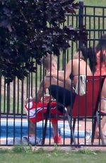SELENA GOMEZ and Justin Bieber at a Pool in Stratford
