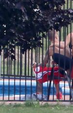 SELENA GOMEZ and Justin Bieber at a Pool in Stratford