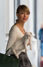 TAYLOR SWIFT in Stockings Out and About in New York