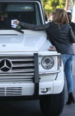 ASHLEY TISDALE in Ripped Jeans Leaves Andy Lecompte Salon in West Hollywood
