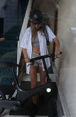 CARA DELEVINGNE Rriding a Bicycle Out in London