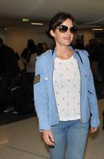 CARLA GUGINO in Jeans at Los Angeles International Airport