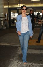 CARLA GUGINO in Jeans at Los Angeles International Airport