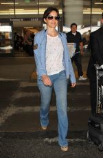 CARLA GUGINO in Jeans at Los Angeles International Airport
