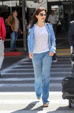 CARLA GUGINO in Jeans at Los Angeles International Airport