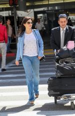 CARLA GUGINO in Jeans at Los Angeles International Airport
