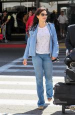 CARLA GUGINO in Jeans at Los Angeles International Airport