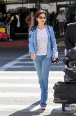 CARLA GUGINO in Jeans at Los Angeles International Airport