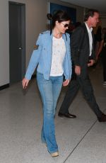 CARLA GUGINO in Jeans at Los Angeles International Airport