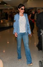 CARLA GUGINO in Jeans at Los Angeles International Airport