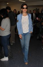 CARLA GUGINO in Jeans at Los Angeles International Airport