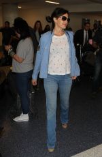 CARLA GUGINO in Jeans at Los Angeles International Airport