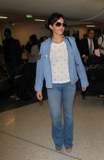 CARLA GUGINO in Jeans at Los Angeles International Airport