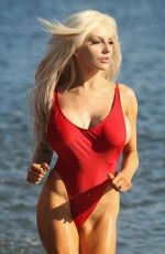 COURTNEY STODDEN in Baywatch Swimsuit at the Beach in Los Angeles